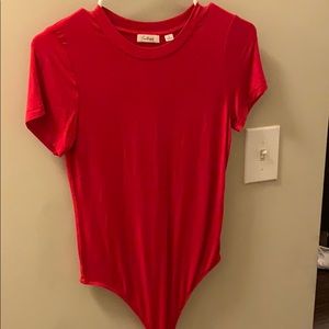 Red thong body suite